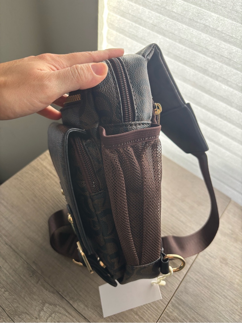 Brown Sling Backpack with Signature Pattern - Picture 8 of 8